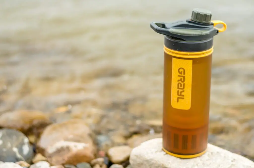Filtering water bottle for travelling